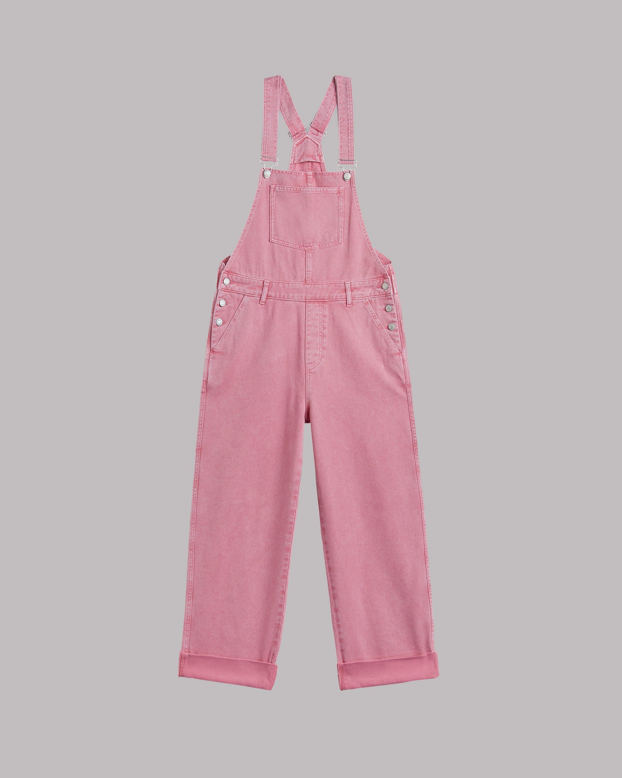 Adjustable strap detail on pink wide-leg overalls
