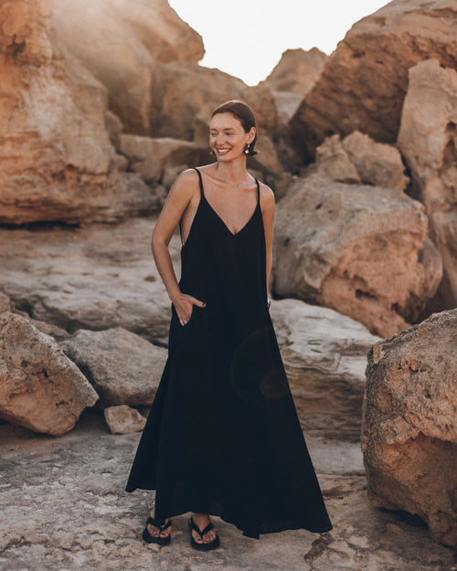 Black slip maxi dress with V-neckline, front view