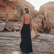 Low back detail on black slip maxi dress